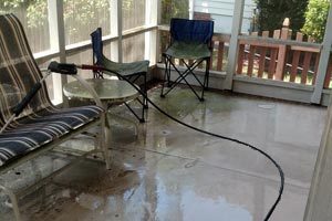 A patio and driveway in Rock Hill, SC during a driveway pressure cleaning service
